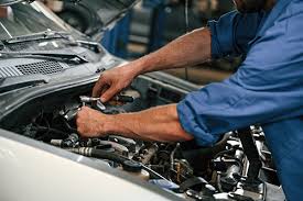 Experienced mechanic performing engine diagnostics and repair at Eastern Auto Works Cambridge MD